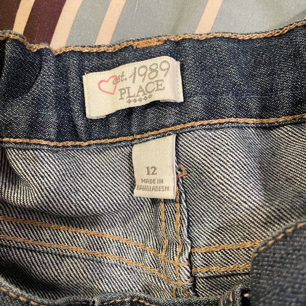 Size girls 12 children’s place jean skirt. Never worn
